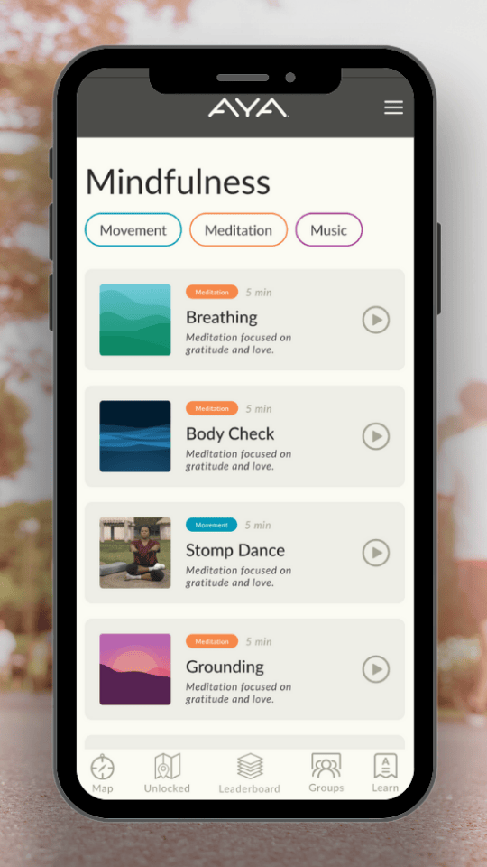 AYA Walking app mindfulness screen showing four activities: Breathing and Body Check with blue wave imagery, Stomp Dance with person photo, and Grounding with purple sunset. Filter tabs for Movement, Meditation, and Music at top. Navigation bar at bottom.